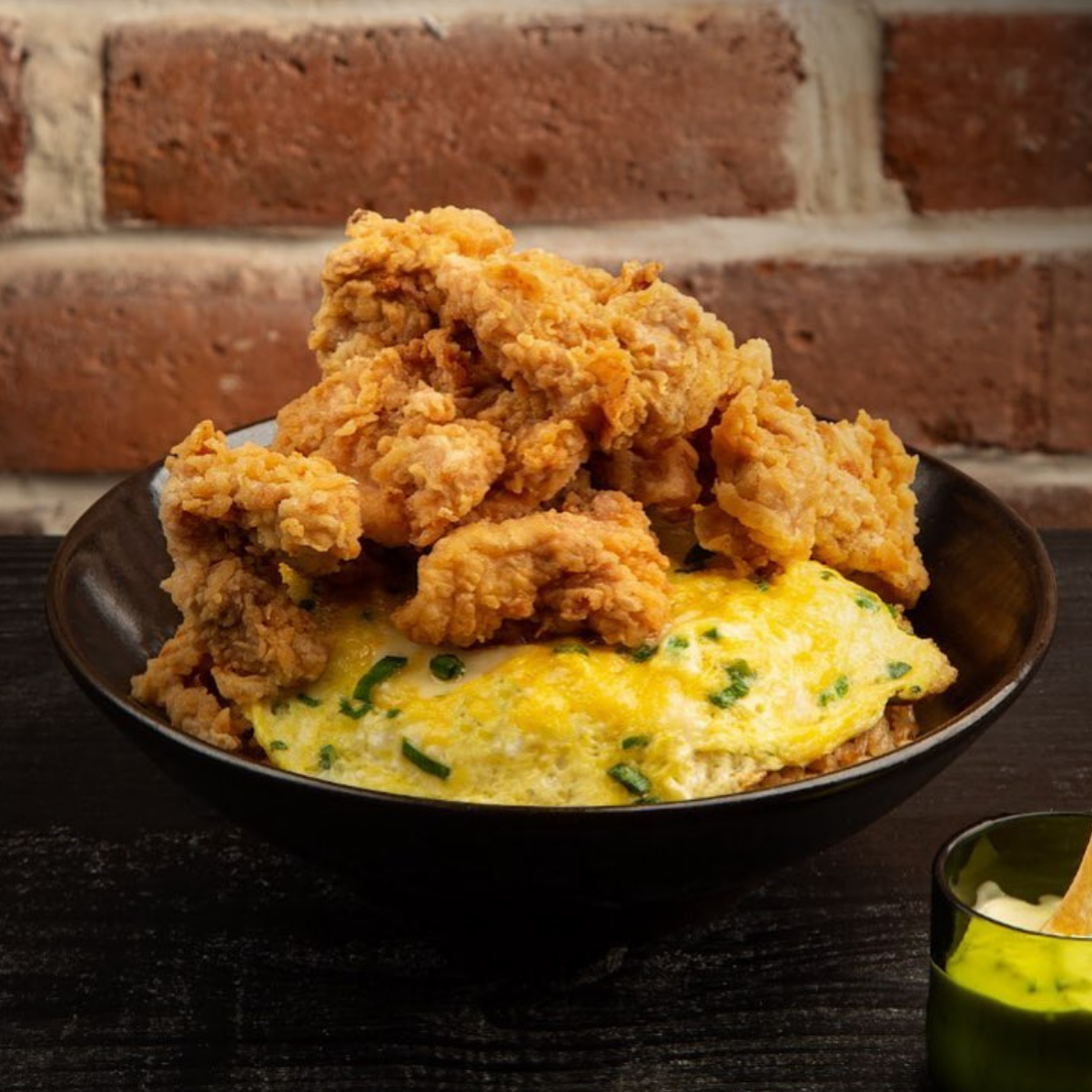 Chicharrón de pollo con chaufa de la casa 